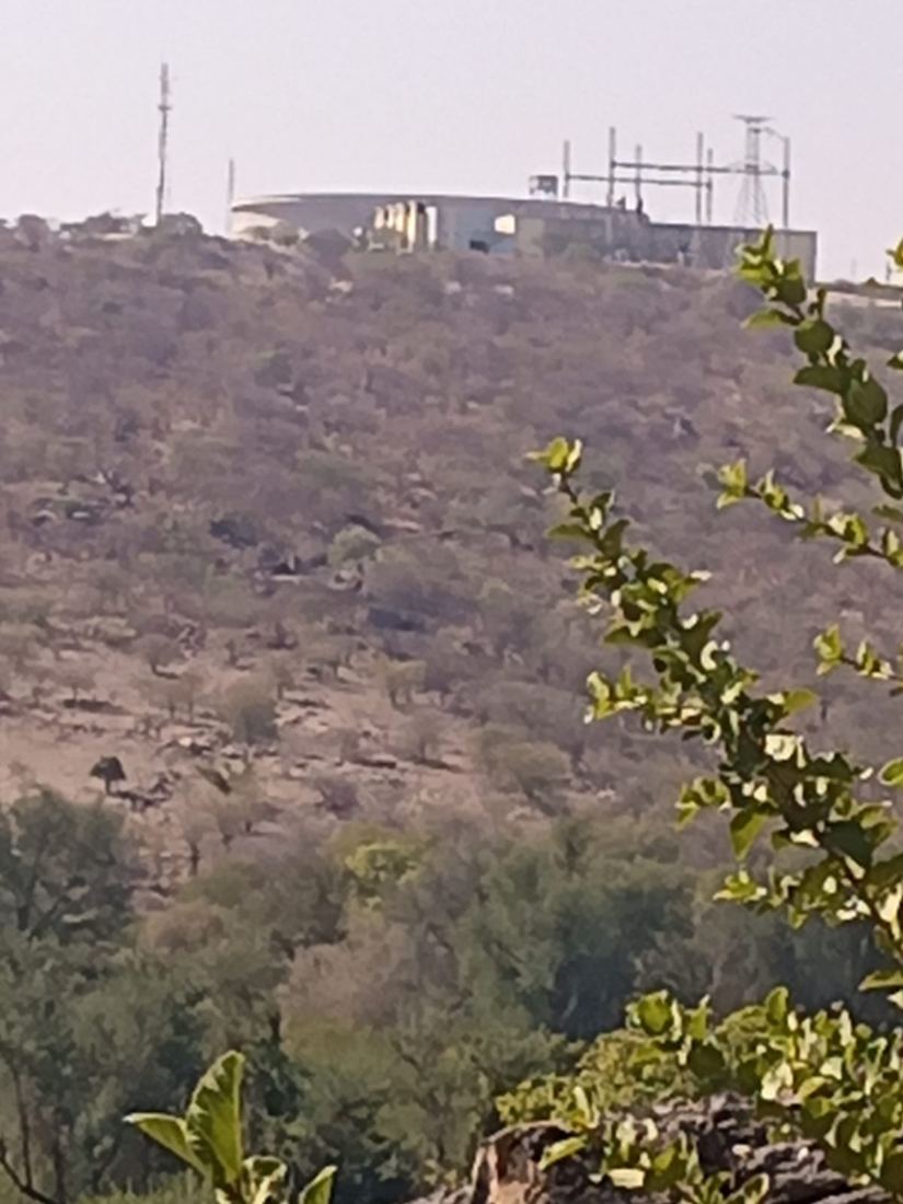 Power station looming up on the hilltop