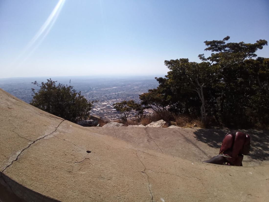 More city view with an unintentional aforementioned Himba womans ochre decorated