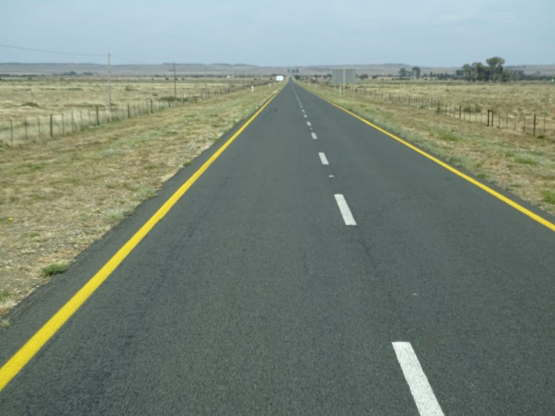The road goes on and on for ever, this section spanned 2 government survey maps